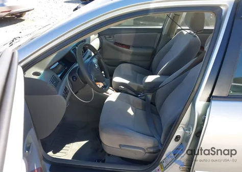 2005 Toyota Corolla Le z USA, uszkodzony, nr VIN 2T1BR30E85C398664